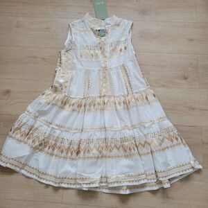 Elegant White and Gold Patterned Mini Dress